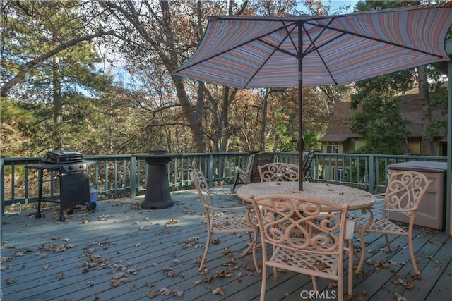 wooden terrace with area for grilling