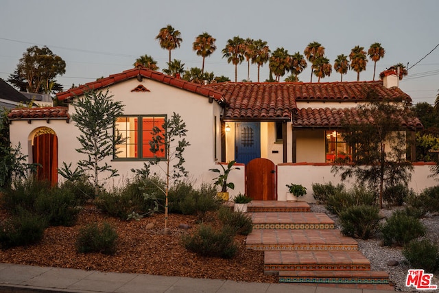 view of mediterranean / spanish-style house