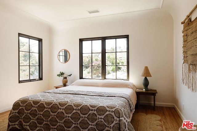 bedroom featuring light wood-type flooring