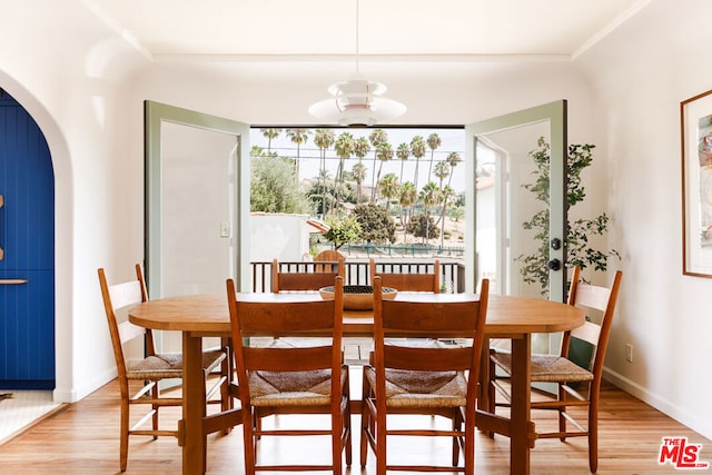 dining area featuring ceiling fan and light hardwood / wood-style floors