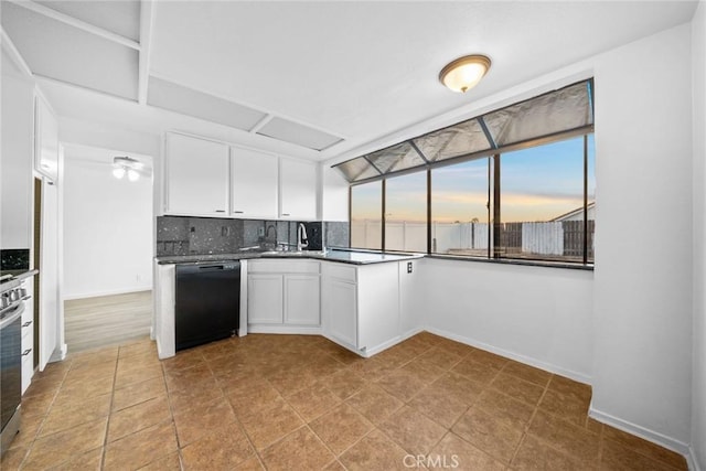 kitchen with backsplash, a wealth of natural light, dishwasher, and white cabinets