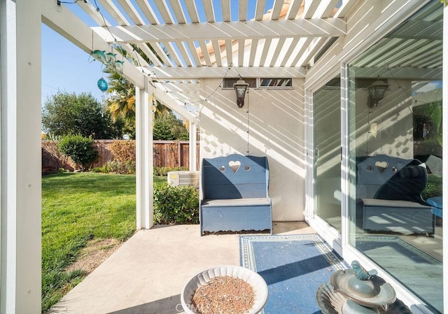 view of patio / terrace with a pergola and fence