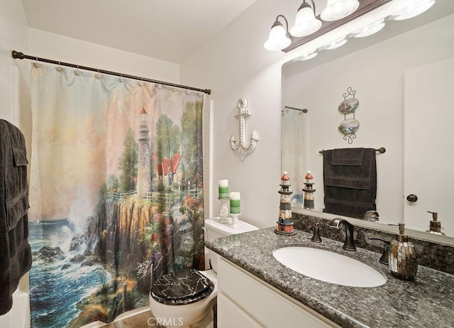 full bathroom featuring curtained shower, toilet, and vanity