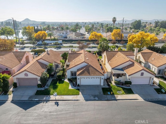 aerial view with a mountain view and a residential view