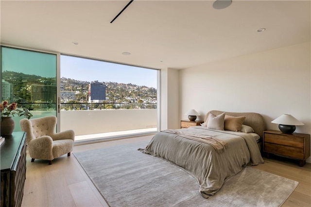 bedroom featuring light wood-type flooring