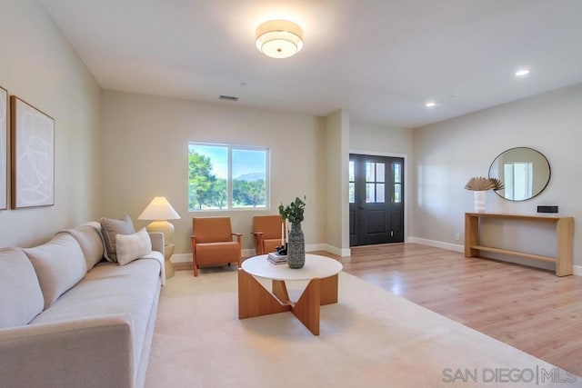 living room featuring light wood-type flooring