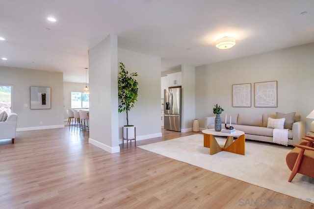 living room featuring light wood-type flooring