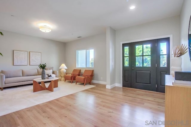 foyer featuring light hardwood / wood-style flooring and plenty of natural light