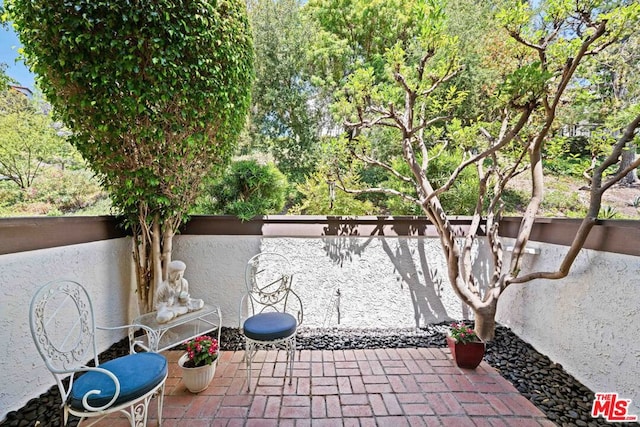 view of patio / terrace featuring a balcony