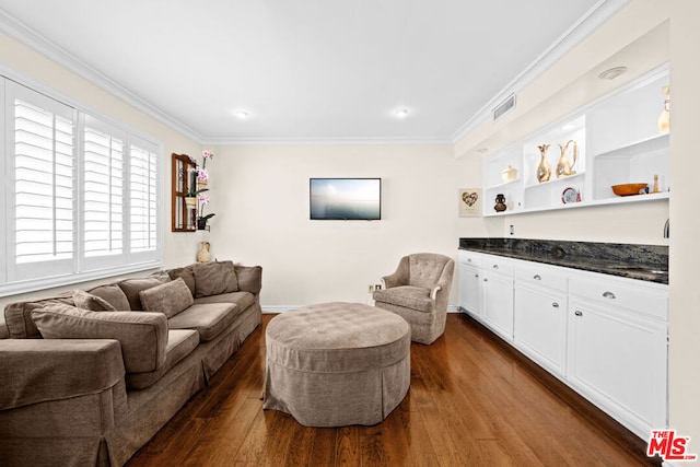 living room featuring crown molding and dark hardwood / wood-style floors