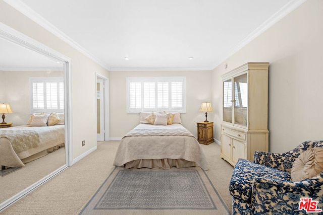 carpeted bedroom featuring multiple windows and crown molding