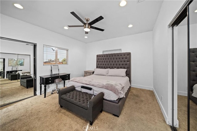 carpeted bedroom with ceiling fan and a closet