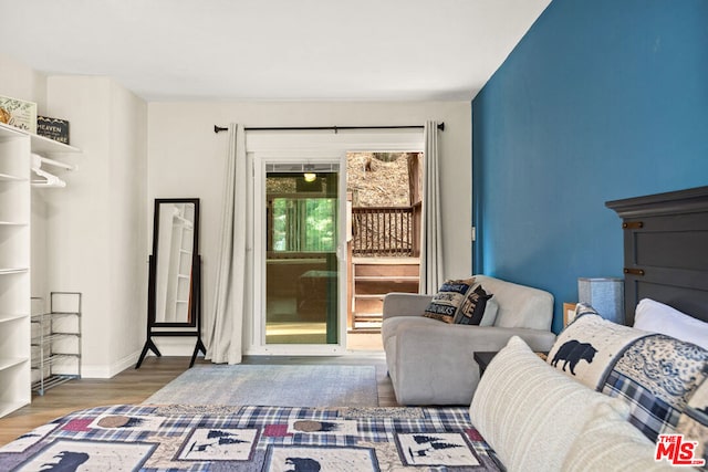 unfurnished living room with wood-type flooring