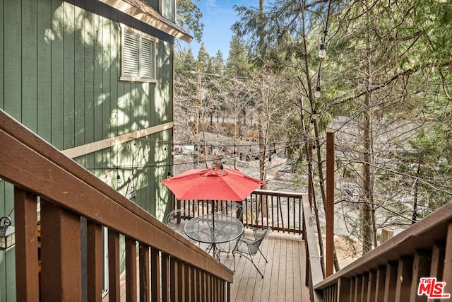 wooden balcony with a wooden deck