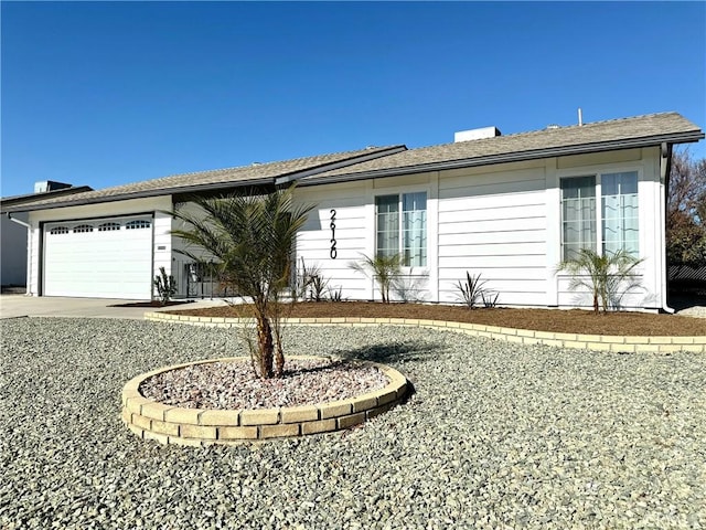 ranch-style home with a garage