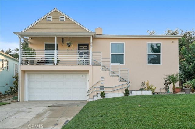 view of front facade featuring a garage and a front yard