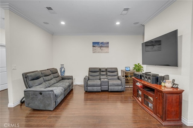 living room with wood-type flooring and ornamental molding