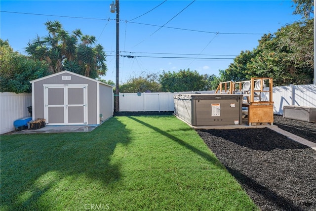 view of yard with a storage shed