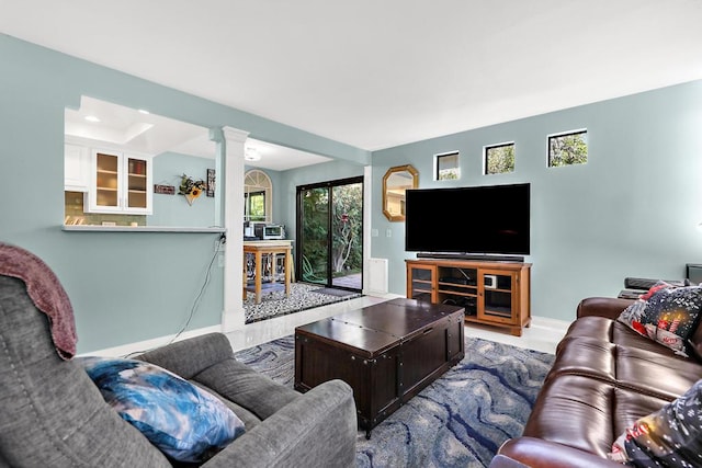 living room with decorative columns