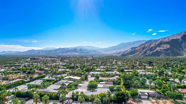 birds eye view of property featuring a mountain view