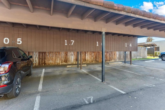 garage featuring a carport