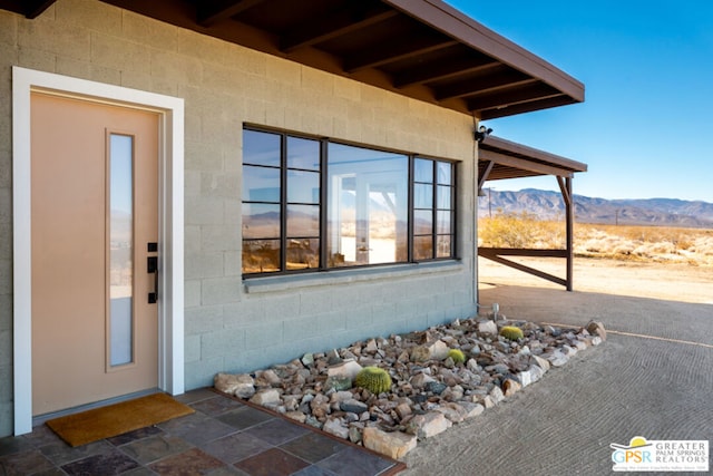 property entrance with a mountain view