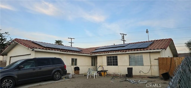 exterior space featuring solar panels