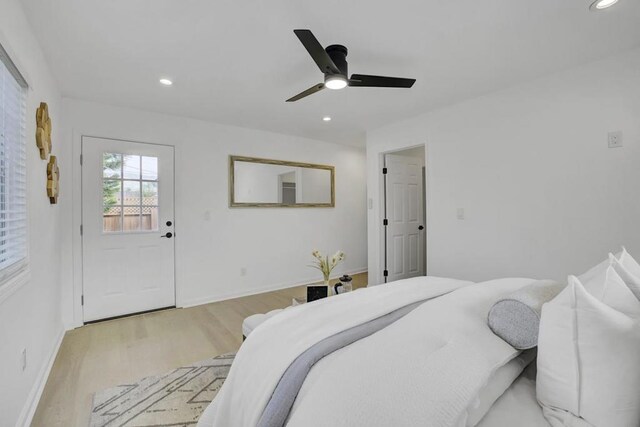 bedroom featuring ceiling fan and light hardwood / wood-style floors