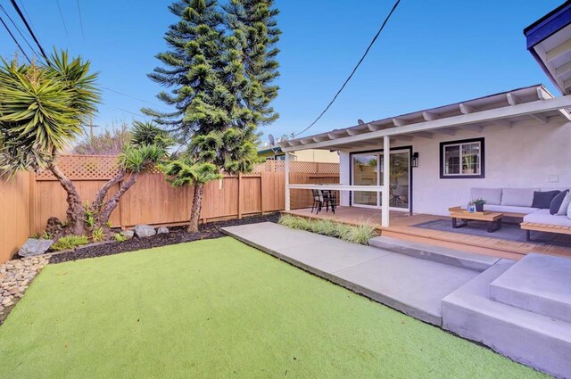 view of yard with a patio area and outdoor lounge area