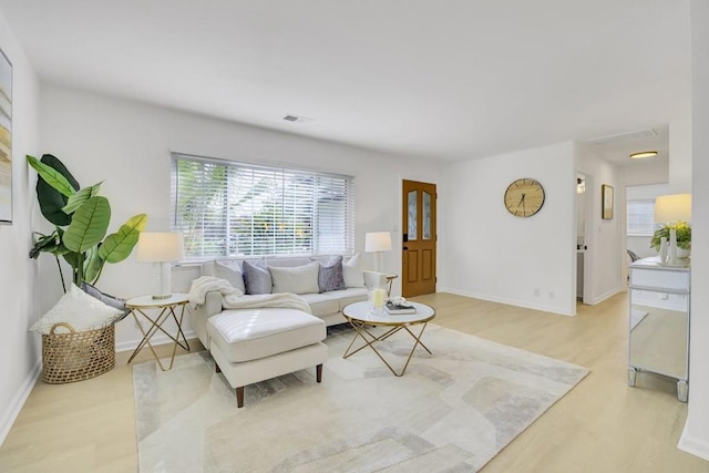 living room with light wood-type flooring