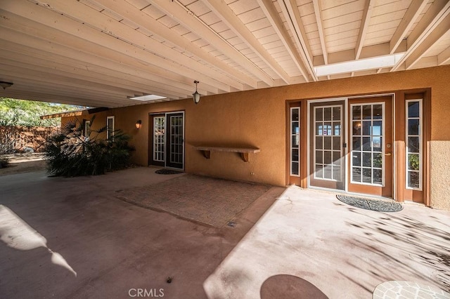 view of patio featuring french doors