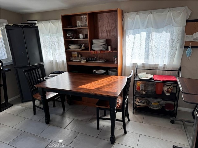 view of tiled dining space