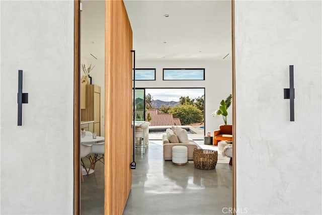 corridor featuring concrete flooring