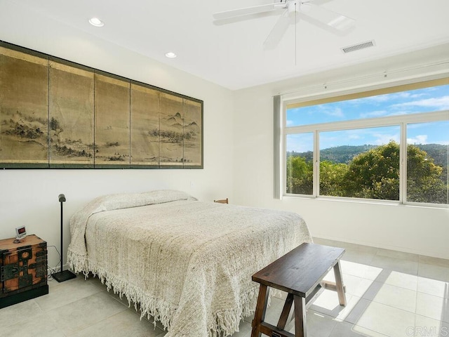 bedroom featuring light tile patterned flooring, ceiling fan, visible vents, and recessed lighting