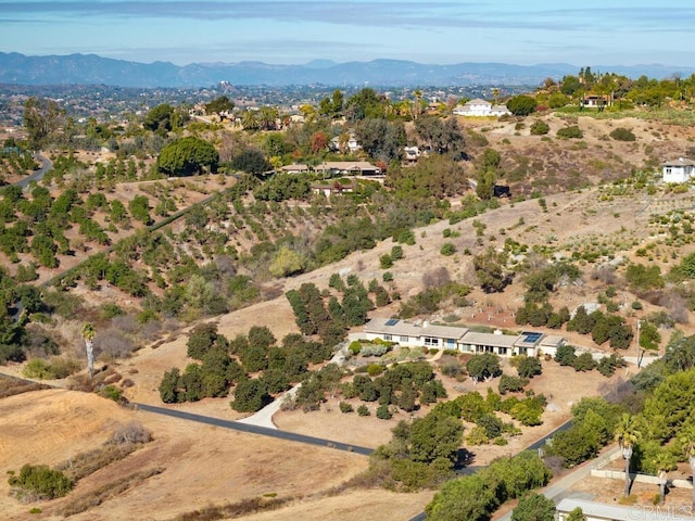 drone / aerial view featuring a mountain view