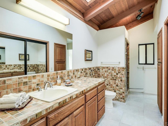 bathroom with a stall shower, toilet, wooden ceiling, tile patterned flooring, and vanity