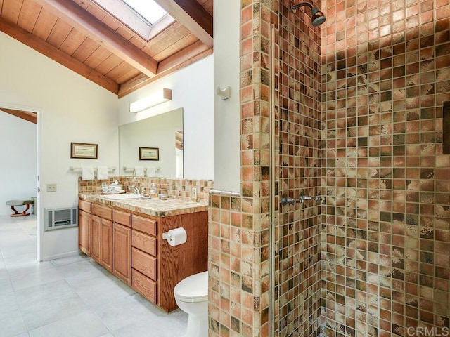 31340 Cottontail Ln, Bonsall, CA 92003 - bathroom with wood ceiling, a tile shower, a skylight, vanity, and toilet