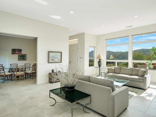 31340 Cottontail Ln, Bonsall, CA 92003 - living room featuring recessed lighting and light tile patterned flooring