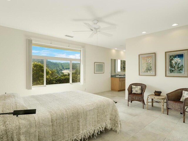 31340 Cottontail Ln, Bonsall, CA 92003 - bedroom with light tile patterned floors and a ceiling fan