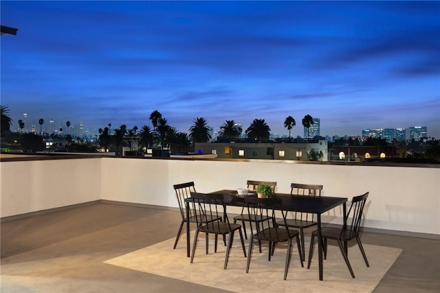 view of patio terrace at dusk