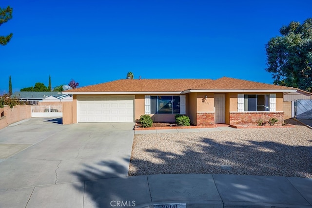 ranch-style home with a garage