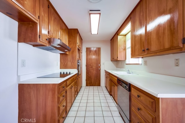 kitchen with appliances with stainless steel finishes, sink, exhaust hood, and light tile patterned flooring