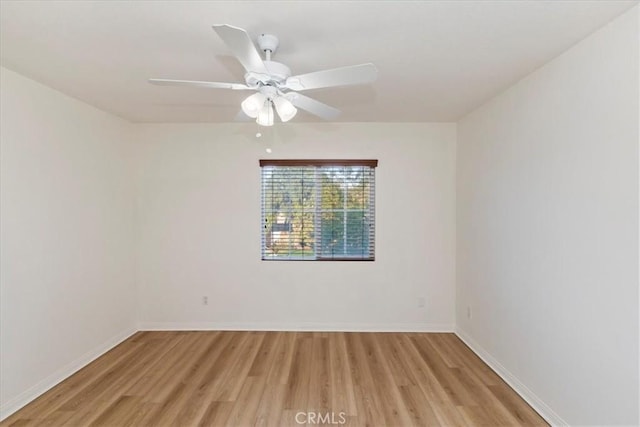 unfurnished room featuring light hardwood / wood-style floors and ceiling fan