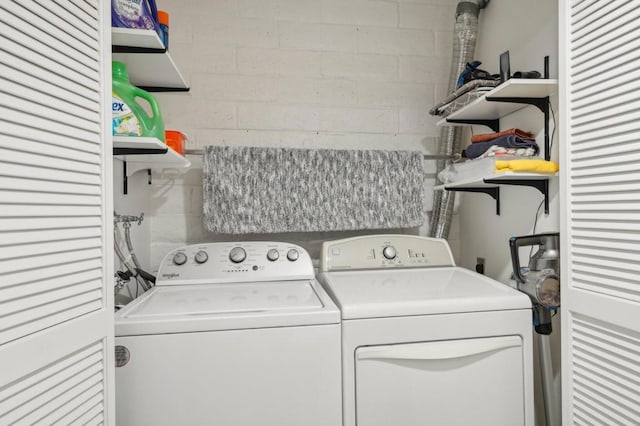 laundry room featuring separate washer and dryer