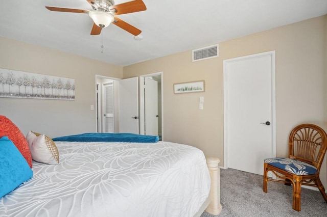 bedroom featuring light carpet and ceiling fan