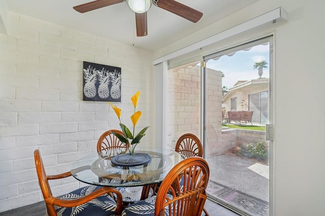 dining room featuring ceiling fan