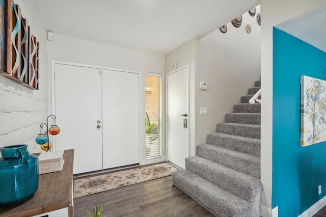 foyer entrance with wood-type flooring