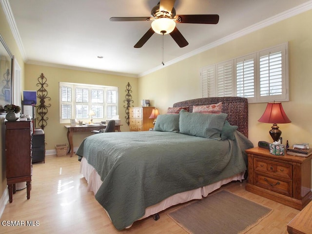 bedroom with ceiling fan, light hardwood / wood-style flooring, and crown molding