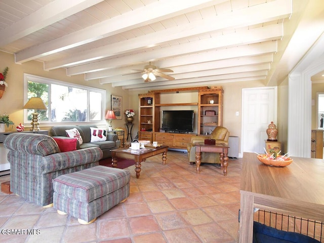 living room featuring beam ceiling and ceiling fan