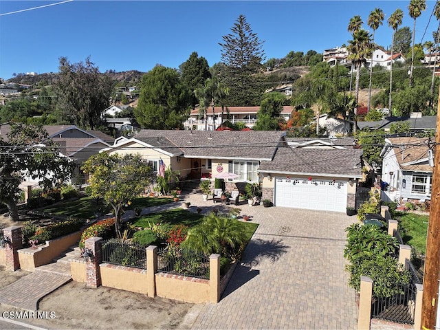 view of front of property with a garage